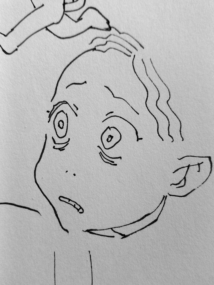 ink on paper drawing of a human face with anguished expression