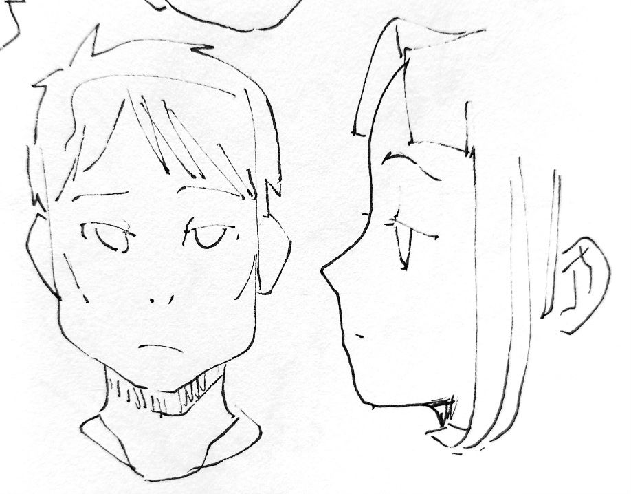ink on paper drawing of two anime faces, one en face, one showing left profile